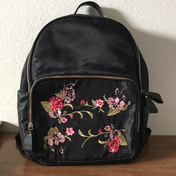 kissme couture Handbags - Black medium sized backpack with floral embroidery